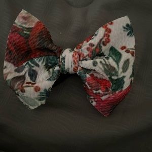 Little lopers Christmas bow on black nylon.